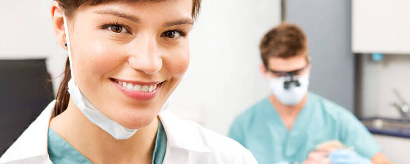 Image of dental assistant at work
