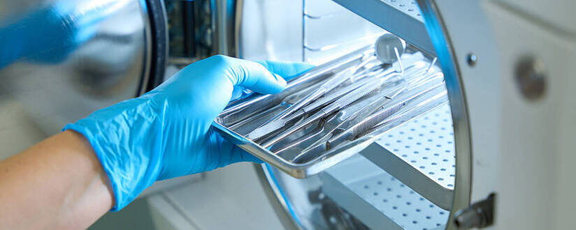 Image of dental tools being cleaned and sterilized