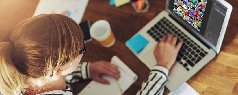 Image of Graphic Designer working on laptop