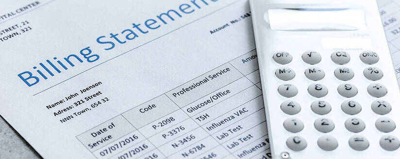 Image of calculator on medical bill