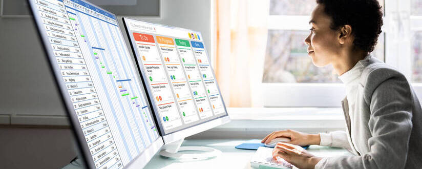 Image of Project Manager working on a laptop